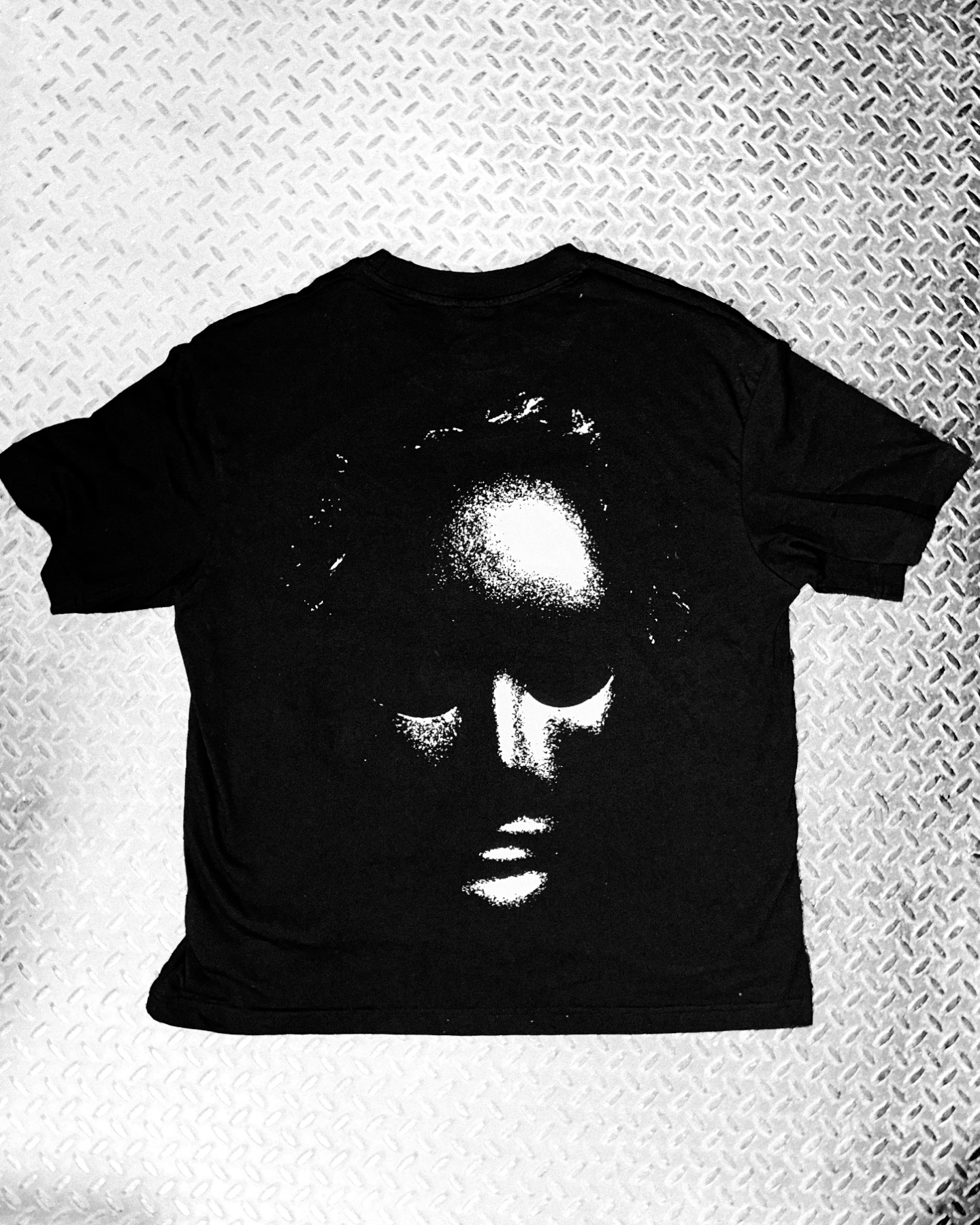Back of the FUGAZI shirt