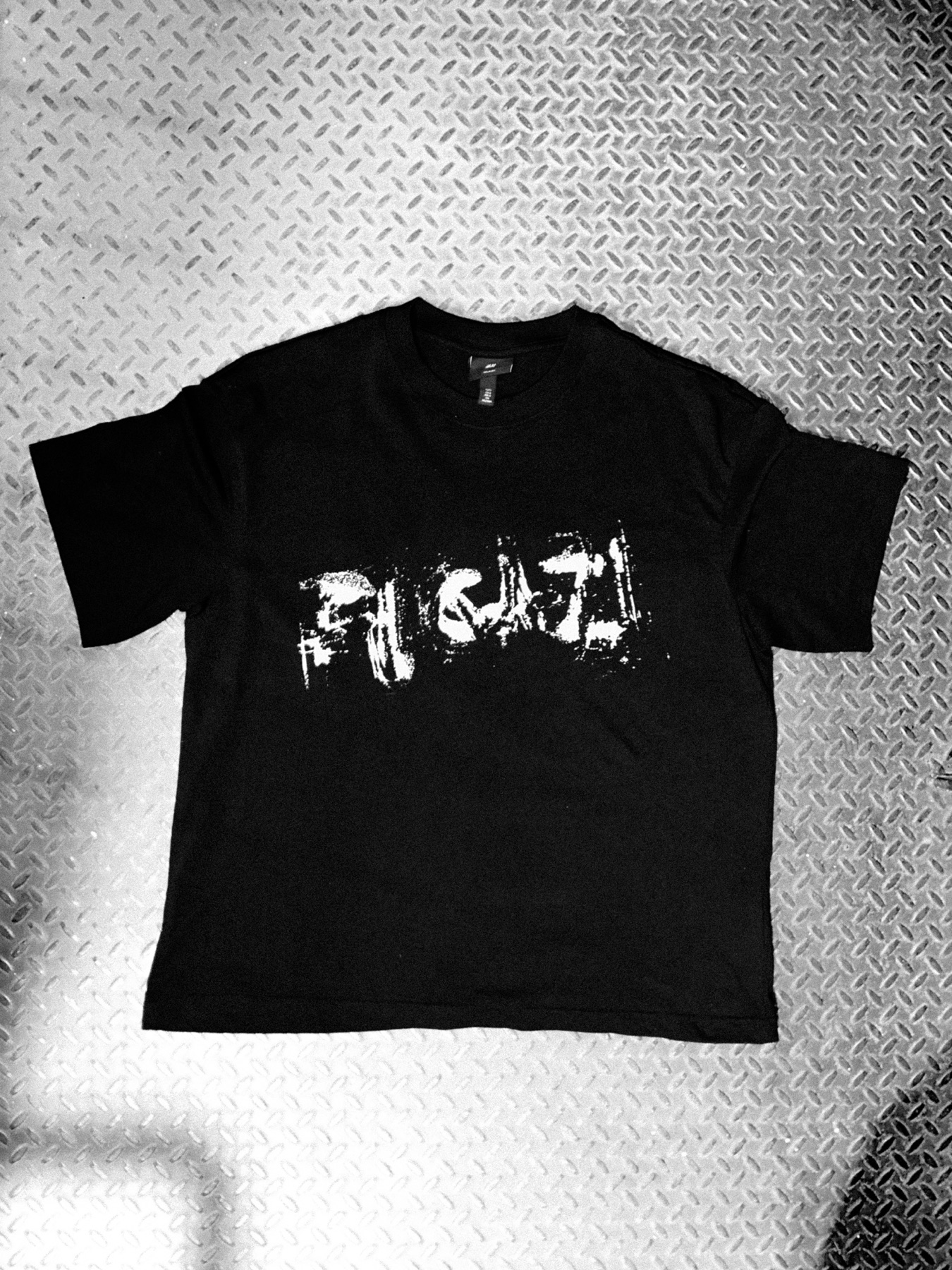 Front of the FUGAZI shirt